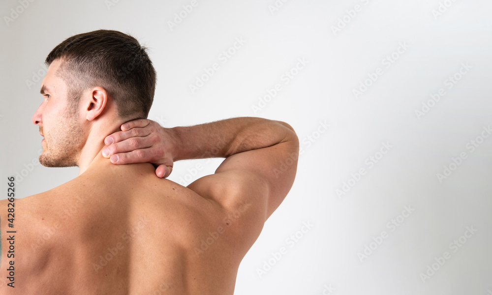 The muscles of the neck in a man on a white background are hurt pain sore painful, backache sick man background adult, muscular neck care, back suffer attractive The muscles of the neck in a man on a white background are hurt pain sore painful, backache sick man background adult, muscular neck care, back suffer attractive