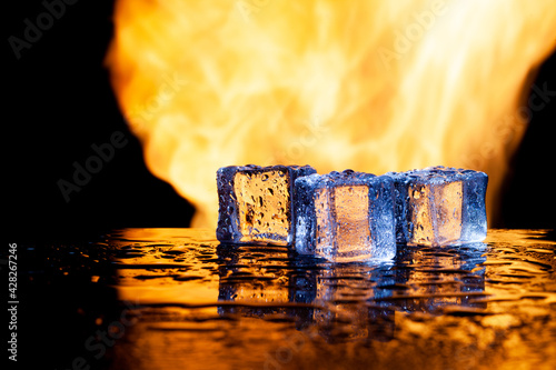 ice cubes on a black background in flames