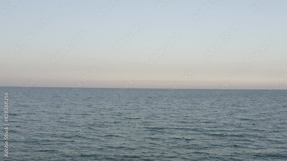 aerial view. view from flying drone on green water with waves in Azov sea, Ukraine. Climate changing, pollution water and environment. pink salt lake aerial view. view from flying drone on green water with waves in Azov sea, Ukraine. Climate changing, pollution water and environment. pink salt lake