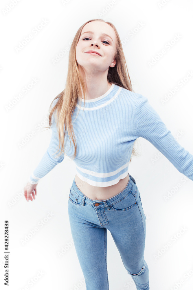 Fototapeta premium young pretty stylish blond hipster girl posing emotional isolated on white background happy smiling cool smile, lifestyle people concept