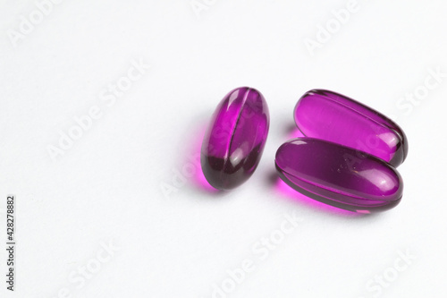 Purple medicine capsules