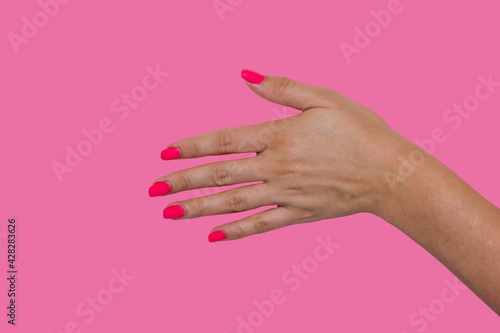 hand palm up isolated on red background, put the subject