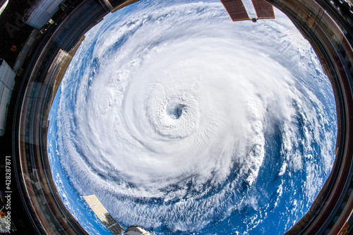 A huge hurricane is seen from the International Space Station. Digital enhancement by the artist. Elements of this image furnished by NASA photo