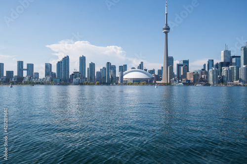 Toronto s skyline seen from a boat on  the Inner Harbour on a perfect summer afternoon.