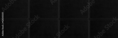 Panorama of Black genuine cow leather of the sofa texture and background seamless