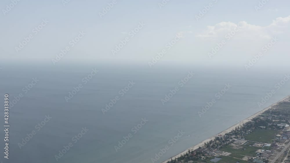 aerial view. view from flying drone on green water with waves in Azov sea, Ukraine. Climate changing, pollution water and environment. pink salt lake aerial view. view from flying drone on green water with waves in Azov sea, Ukraine. Climate changing, pollution water and environment. pink salt lake