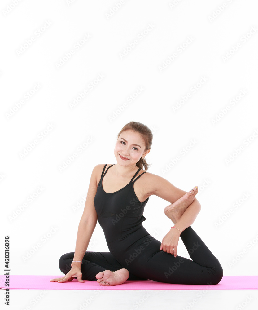Asian woman exercise and stretching body with yoga pracetice. Concept for health and balance life Asian woman exercise and stretching body with yoga pracetice. Concept for health and balance life