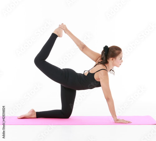 Asian woman exercise and stretching body with yoga pracetice. Concept for health and balance life