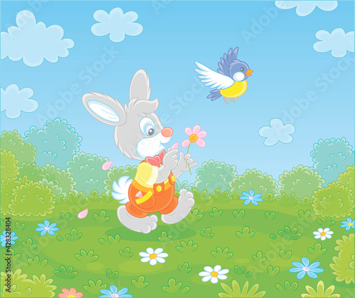 Little enamored bunny guessing on a daisy and walking on green grass of a pretty summer field with flowers on a beautiful warm day, vector cartoon illustration