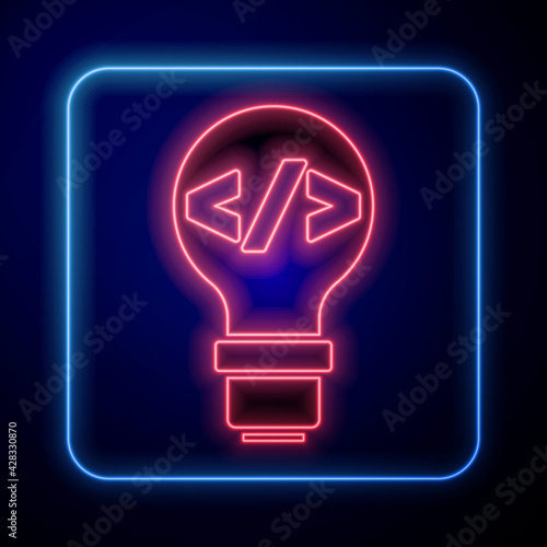 Glowing neon Web design and front end development icon isolated on blue background. Vector