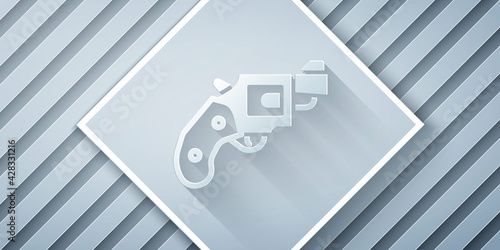 Paper cut Small gun revolver icon isolated on grey background. Pocket pistol for self-defense. Ladies revolver. Spy Weapon. Paper art style. Vector