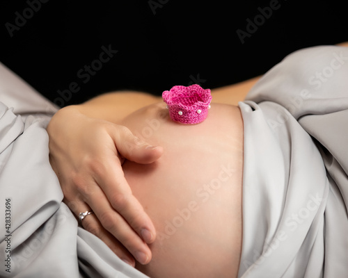 woman holding her belly