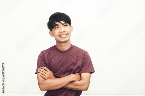 Smiling handsome Asian man in casual t-shirt
