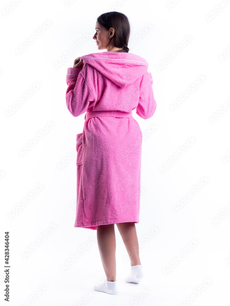 woman in a dressing gown from the back on an isolated white background. woman in a dressing gown from the back on an isolated white background.
