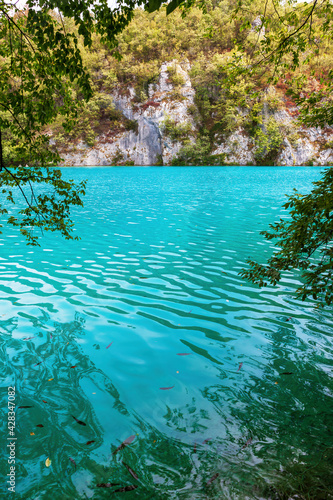 Plitvice Lakes National Park is a colorful landscape with turquoise-blue water in Croatia
