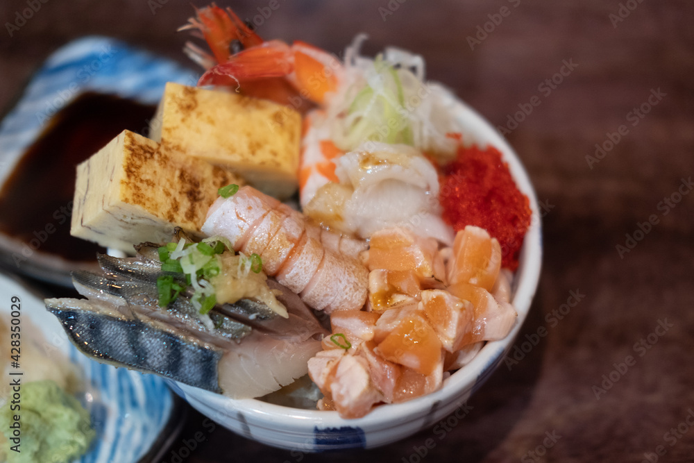 Kaisen-dong is a seafood covered rice topped with seafood and raw fish Kaisen-dong is a seafood covered rice topped with seafood and raw fish