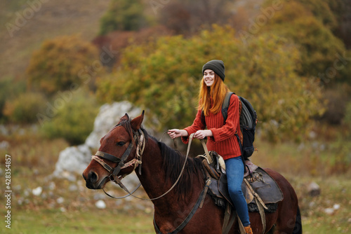 pretty woman in nature walk fun horse with travel