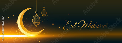 shiny eid mubarak golden moon and lantern banner