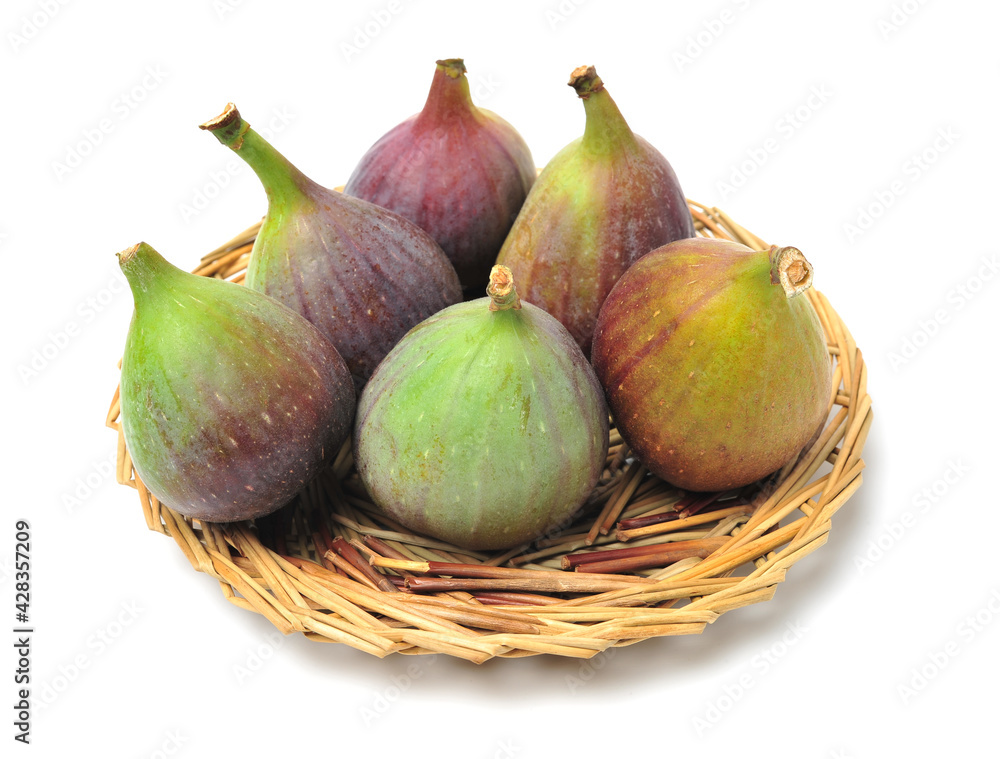 Ripe figs on a white background