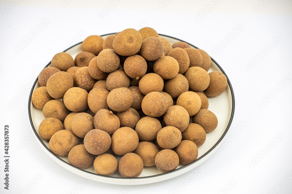 A dish of dried longan in good color A dish of dried longan in good color