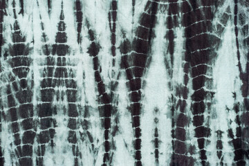 tie dye pattern hand dyed on cotton fabric abstract texture background.