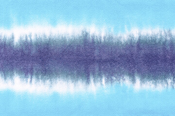 tie dye pattern hand dyed on cotton fabric abstract texture background.