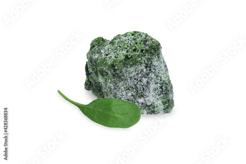 Spinach on an isolated white background. Frozen and fresh spinach. Healthy food concept