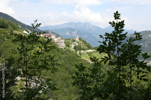 Mountain landscape with the town of Guardia, Trentino, Italy