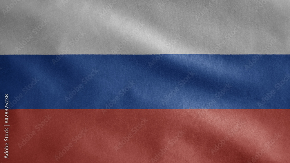 Russian flag waving in the wind. Close up of Russia banner blowing soft silk.