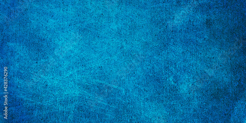 blue colored grunge wall texture for banner, backdrop