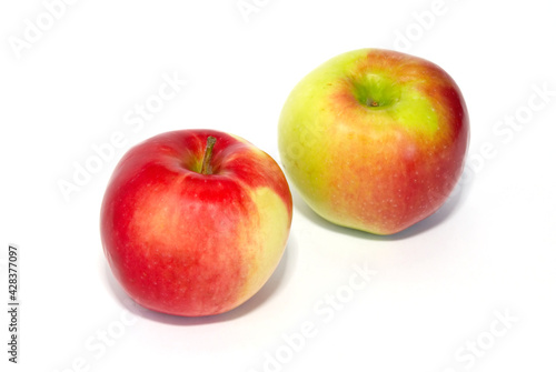 Two red fresh apples isolated on white
