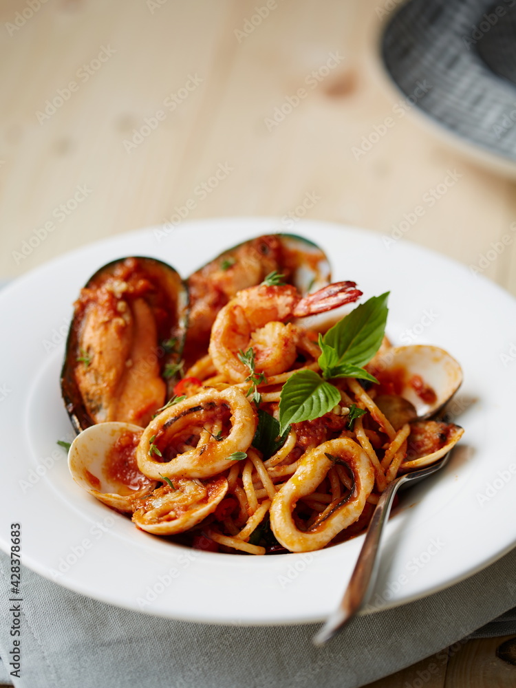 Spaghetti with Mussel in tomato and herbs sauce Thai style Spaghetti with Mussel in tomato and herbs sauce Thai style