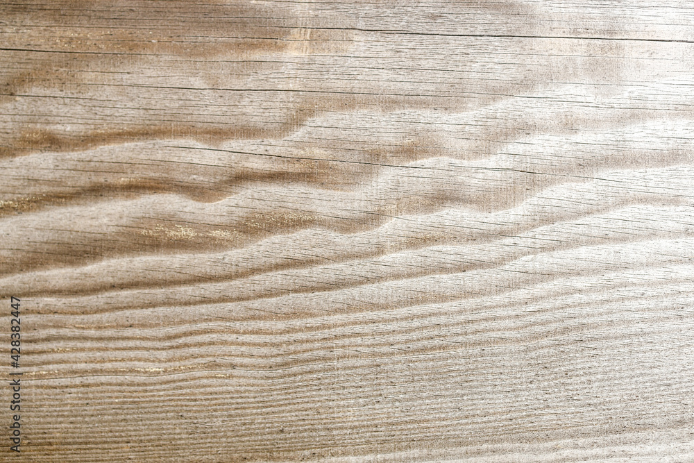 wood background in brown color, longitudinal cut of wood with waves wood background in brown color, longitudinal cut of wood with waves