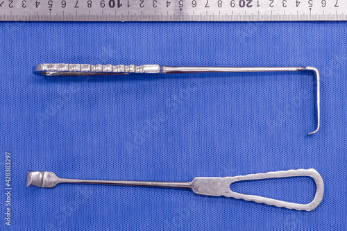 Langenbeck retractor on a blue background