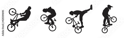 A set of BMX freestyle sportsmen silhouettes . Collection of freestylers performing stunts. Jumping and somersault guys with mountain bikes. Flat style vector design illustrations.