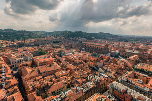 Bologna, Italy - September 7, 2020: Aerial view of historical city center with car traffic and old buildings