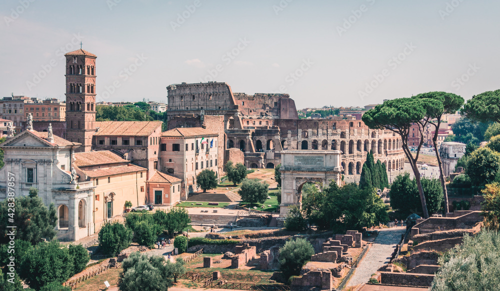 Panoramic view of the Roman Forum with Coliseum in background