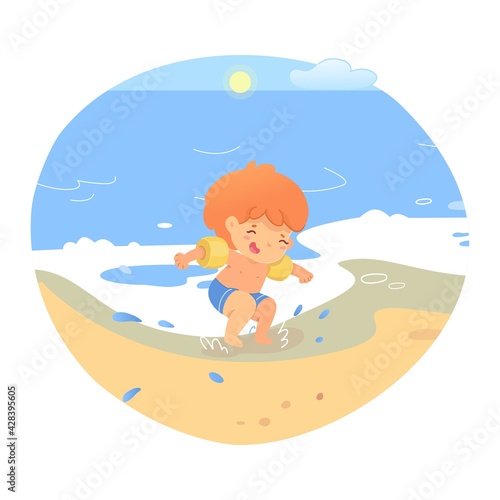 Little boy jumping in water on beach coastline