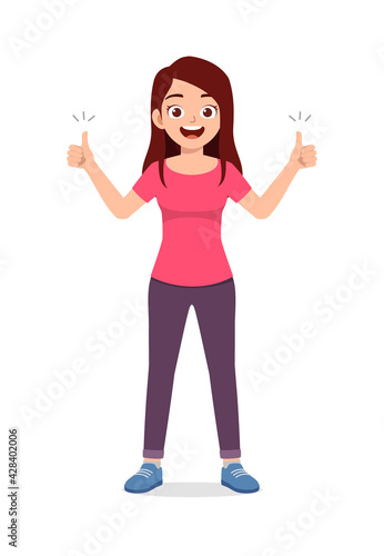 young good looking woman doing thumb up pose