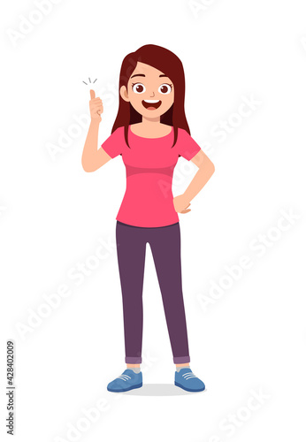 young good looking woman doing thumb up pose
