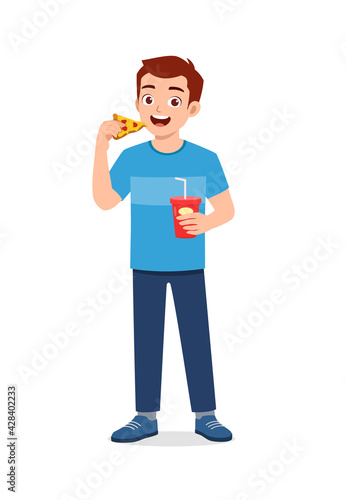 young good looking man eat unhealthy fast food