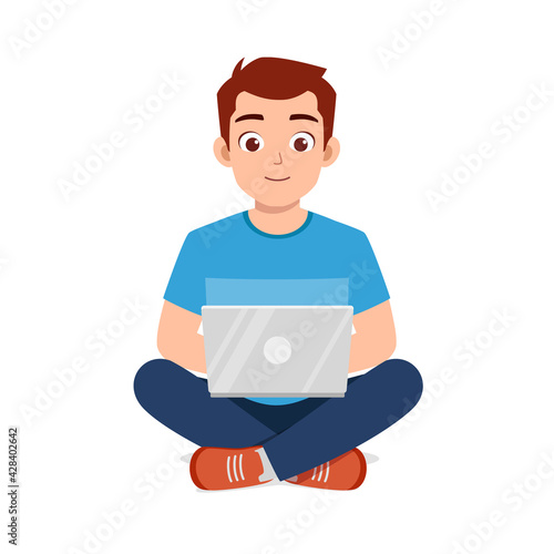 young good looking man using laptop and work