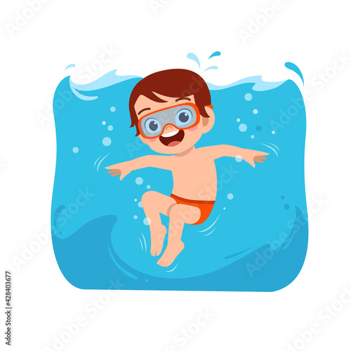 cute little kid boy swim under water on summer holiday