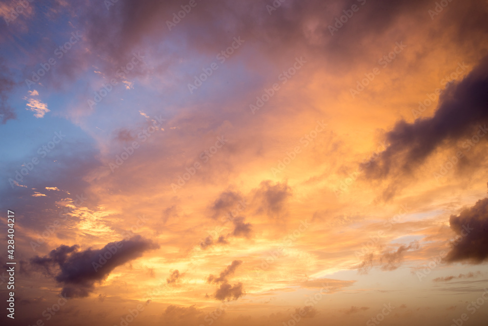Colorful sunset sky over tranquil sea surface