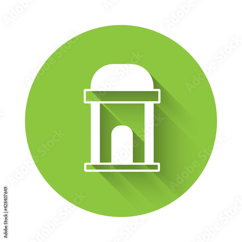 White Old crypt icon isolated with long shadow. Cemetery symbol. Ossuary or crypt for burial of deceased. Green circle button. Vector