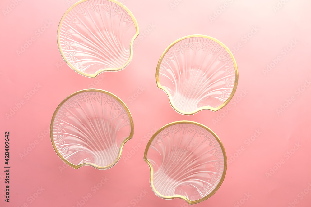 top view of many empty bowl on pink background top view of many empty bowl on pink background