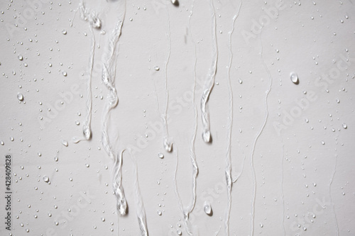 Rain and water droplets are flowing through the walls.