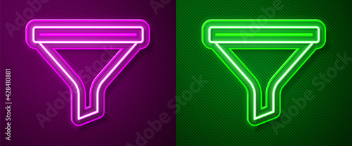 Glowing neon line Funnel or filter icon isolated on purple and green background. Vector