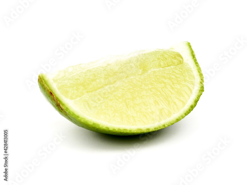 
Ripe slice of green lime citrus fruit stand isolated on white background,element of food healthy nutrients and fruit healthy concept	