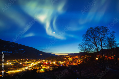 Aurora over city
